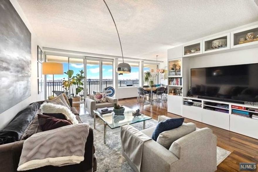 HALLEY NATKIN & COLDWELL BANKER REALTY PRESENT 3 HORIZON RD #808...AMAZING OPPORTUNITY-JUST UNPACK & MOVE IN! BEING OFFERED FURNISHED! **ALL UTILITIES-TAXES and PARKING SPOT INCLUDED IN MONTHLY FEES! THE BEST VIEWS ON THE NJ GOLD COAST! Beautiful 2 bedroom/2 bath Bi-level home with unparalleled views of NYC. Entry Foyer leads to an elegant Living Room, Formal Dining Room, and well appointed galley style Kitchen. The space is highlighted w/floor to ceiling windows and a HUGE 24' terrace w/no obstructions! All rooms on one level-with views from Every room. MONTHLY FEES TOTAL $2165.95 (MAINT $1825.13 PARK $44,CBL/INT$48.90,CAP ASSESS $247.92) INCLUDES ALL utilities, Taxes, Parking, and u/l mortgage. Partially Tax Deductible! Amenities addl. Board approval required. Min. Gross income for cash buyer w/no debt $104k.CONTACT HALLEY NATKIN 917*626*8240