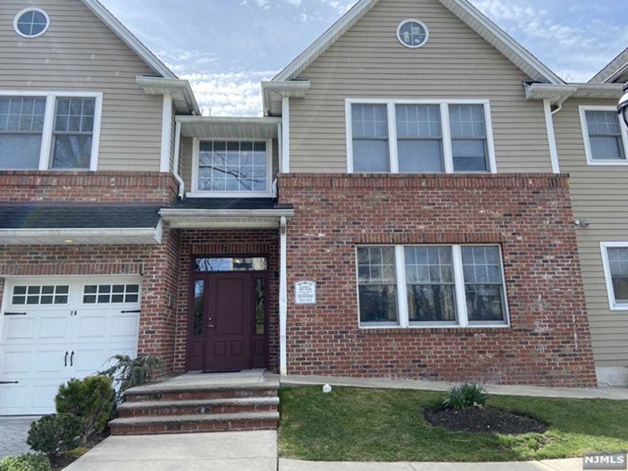 This sun filled two bedroom, two full bath second floor unit is conveniently located nearby schools, shops, transportation and town center. Kitchen with granite counter-tops, stainless steel appliances and pass thru kitchen island that open up to the living room space. Unit comes with 1 detached garage and 1 outdoor parking space. No pets.