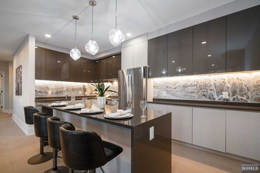 Appealing New Incentives Available on a 12M+ lease! Inquire today! Stunning, brand new construction ultra-luxury rental building on River Road in North Bergen. Absolutely gorgeous finishes and features with tons of amenities. Amazing Pool & Pool Deck with fire pit and grills with unobstructed NYC views. On-site gym, doorman, and garage parking available. Units currently available: 1 bed / 1 bath layout; 2 bed / 2 bath layout; and duplex-style 2 bed / 3 bath layout. State of the art kitchens boast Bosch appliances, sleek European-style cabinetry, under-cabinet lighting, waterfall quartz countertops, and center islands. Bathrooms offer imported porcelain tiles, Grohe trim package, and floating vanities. 7-inch hardwood flooring throughout. Laundry in unit. Storage available. Amazing location so close to transportation into NYC... Ferry & Bus! Close proximity to fabulous restaurants, shopping, Hoboken, and more. Pet may be considered. Credit Check & Proof of income required.