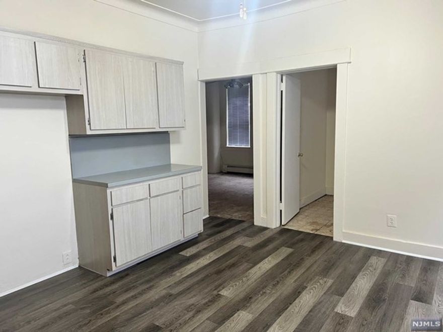 Excellent and spacious two bedroom apartment on the first floor featuring a new kitchen, new floors and carpets and fresh coat of paint! Conveniently located within a close proximity to schools, parks and transportation. Apartment features a living room, eat-in kitchen, 2 bedrooms and full bathroom. Tenant responsible for 1.5 month security deposit, 1 month real estate fee and 1st month's rent. Street parking only.