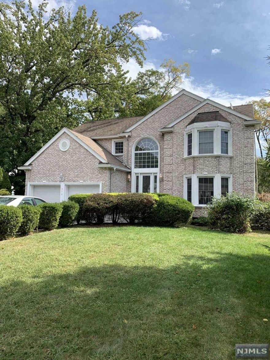 Nicely maintained brick colonial perfect for todays living. The two story entrance foyer is light and bright. A large living room and formal dining room, large eat in kitchen with brand new stainless steel appliances overlooking family room with sliders to deck. Set back from the road on .41 acres fully fenced in rear yard. Upstairs are the main bath, three bedrooms, plus the spacious master bedroom with master bath and two large walk in closets. Full unfinished basement with high ceilings perfect for additional space, or just leave for storage. Close to schools shopping and transportation.