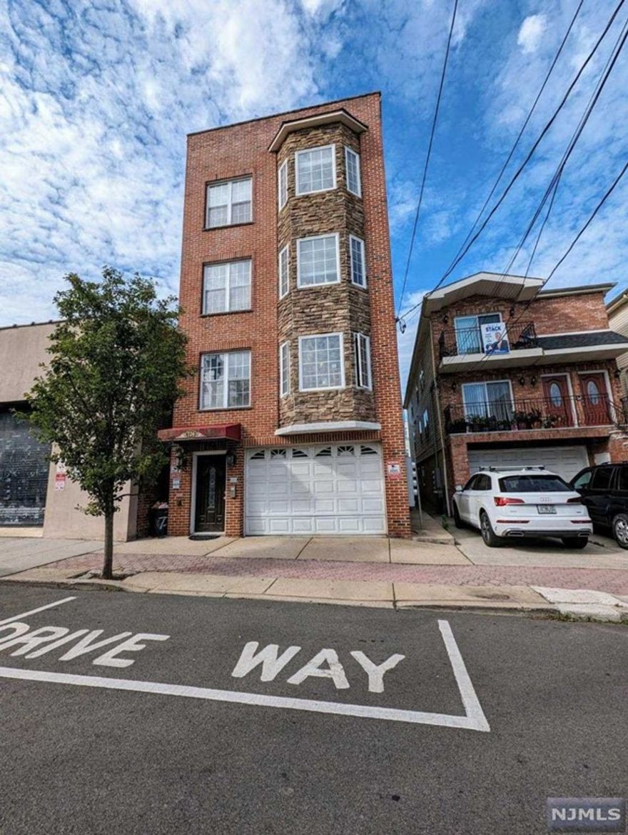 Welcome to your new home in Union City! This spacious 3-bedroom, 2-bathroom condo is situated on the 3rd floor of a walk-up building, offering a comfortable and convenient living experience. The layout includes a living room, eat-in kitchen, a bonus room perfect for office space, and a primary bedroom with an ensuite bath. The primary bedroom faces east, providing beautiful sunrise views and a partial view of New York from its balcony. The kitchen and floors were renovated a year ago, featuring a new Samsung Bespoke refrigerator and a quiet Samsung dishwasher. Enjoy the convenience of a large capacity washer and dryer in-unit, as well as HVAC central A/C and forced hot air. Indoor parking is available. Tenant pays for gas, electric, heat, cold water, hot water, and sewer. Ideal for those seeking a vibrant and accessible location with easy access to local amenities and transportation options. Available starting August 1, 2024.