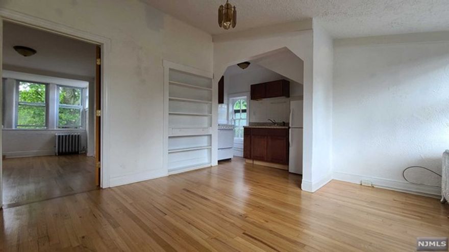 Nice sized junior one bedroom apartment . 1/2 block from Grand Avenue and Fort Lee Road. It is located on the third floor of a recently restored Victorian home. Freshly painted,Hardwood floors throughout Laundry on premises. Quiet residential neighborhood, Near public schools, Next to Overpeck Park and Wood Park. Convenient for shopping, Located blocks away from H Mart, NJ Transit Buses #166, 182, 751, 755, 756 , Near routes: 95, 4, 80, NJ Turnpike