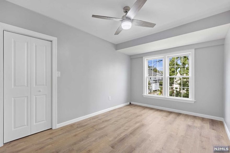 Beautiful, gut-renovated home for rent with off-street parking in Kearny! This 4 bed/1.5 bath, 1,600 sq ft home with a brand-new deck in the backyard, new landscaping for great curb appeal, off-street parking, and plenty of versatility for today's dynamic home, work, and school needs. Home features a sunny, modern, and well-designed kitchen with high-end finishes and appliances, with a convenient walk-out onto the raised deck for weekend al fresco meals and happy hours, a chic full bathroom, brand-new half-bath, new flooring and light fixtures throughout, new boiler and water heater, upgraded 200-amp electrical service, plenty of storage space and a laundry area in the dry basement, and even a garden bed in the rear for all your urban farming needs. Enjoy three levels of living space. The first floor features a front-facing sunroom, which can be used as a mud room, a tranquil coffee and reading nook.