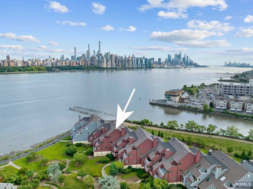 Wow! must see this full-renovated luxurious duplex w/ spectacular NYC views from every room. Situated in the Roc Harbor gated community right on the edge of the Hudson River, this oasis is approx. 2540 sq. ft. & offers waterfront walkway access. Beautiful oak hardwood flooring throughout, large living room w/ gas fireplace that overlooks the city. Gorgeous kitchen w/ custom cabinetry, stone counters, large island, high-end Thermador s/s appliances and pantry room, 2 balconies w/ scenic views, sky light, in-unit elevator & private 2 car garage. New plumbing, electric, elevator, HVAC, master & hallway baths w/ radiant floor, tankless water heater & much much more! Just steps away from NJ Transit bus to NYC, ferry bus to Weehawken Ferry & Hudson LightRail. Close to parks, shopping, restaurants and more. In the process of changing complex siding to Hardie board (see rendering photos). View VIRTUAL TOUR for more details and floor plans. Taxes has been reduced to 11,247.22