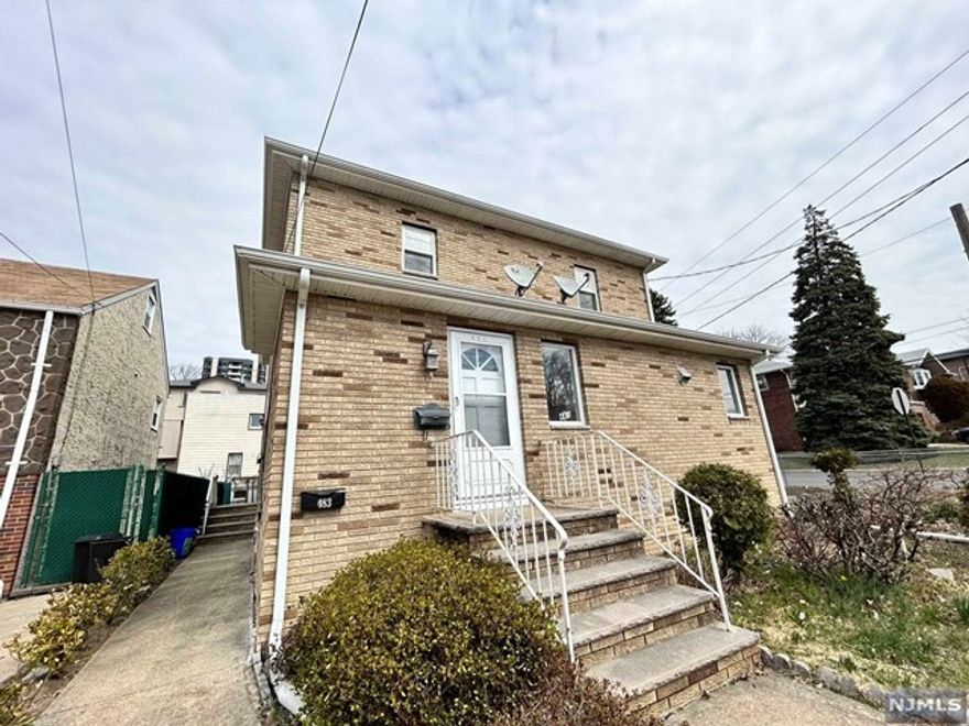 Brick home, Newly Updated, Freshly Painted. 2 bed 1 Bath Apartment in Professionally landscaped 2 family home has fantastic natural light beaming in from the large windows and hard wood floors throughout. Driveway parking (2).