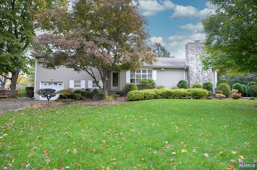 FOR RENT: 4 BEDROOM 3 BATH SPLIT LEVEL IN GLEN ROCK WITH LARGE ROOMS AND LOTS OF STORAGE SPACE AND NEW HARDWOOD FLOORS THROUGHOUT. ENTRY HALL WITH CLOSET LEADS TO THE FORMAL LIVING ROOM WITH BUILT IN SHELVES AND LARGE BAY WINDOW. A SUNNY DINING ROOM AND FAMILY ROOM TOWARD THE BACK OF THE HOUSE HAS VAULTED CEILINGS, SKYLIGHTS AND SLIDING GLASS DOORS TO A LARGE DECK AND PATIO. THE NEWER EAT IN KITCHEN ALSO HAS SLIDING GLASS DOORS TO THE DECK FOR A SEAMLESS FLOW FOR ENTERTAINING. THE GROUND LEVEL FEATURES A REC ROOM, FULL BATH, AND BEDROOM - GREAT FOR GUESTS! THE UPPER LEVEL HAS A HALL BATHROOM AND 3 BEDROOMS INCLUDING A PRIMARY BEDROOM AND BATH. ALL BEDROOMS HAVE GREAT CLOSET SPACE. THE BASEMENT IS FINISHED AND OFFERS LAUNDRY, AND MORE STORAGE. CENTRAL AIR, BUILT IN SHELVING, FIREPLACE IN FAMILY ROOM, DOUBLE WIDE DRIVEWAY AND ATTACHED GARAGE. CLOSE TO SCHOOLS, PARKS, WORSHIP AND TRANSPORTATION. TENANT RESPONSIBLE FOR LAWN CARE AND SNOW REMOVAL.