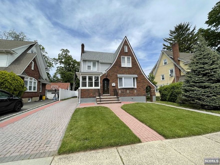 Welcome to this beautifully updated colonial! The first floor of the home features a spacious living room with a wood burning fireplace, large dining room, a new modern eat-in kitchen with stainless steel appliances, and a half bathroom. Second level of the house you will find three bedrooms and one full bathroom with a whirlpool tub. Finished attic for storage. The home also has a fully finished basement with a family room, full bathroom/laundry room, and utility. The other features include central A.C. 2 Zone, and hardwood floor throughout the house, unattached one-car garage, and a deck off the kitchen and dining area. The driveway is long and the backyard is private with a garden room attached to the garage. The house is located in a friendly neighborhood and close to worship areas, parks, schools, and transportation into NYC and major highways. Please contact Mohammad Iqbal for showings at: Email: miqbal@tocr.com Cell: +1 (201) 755-2429