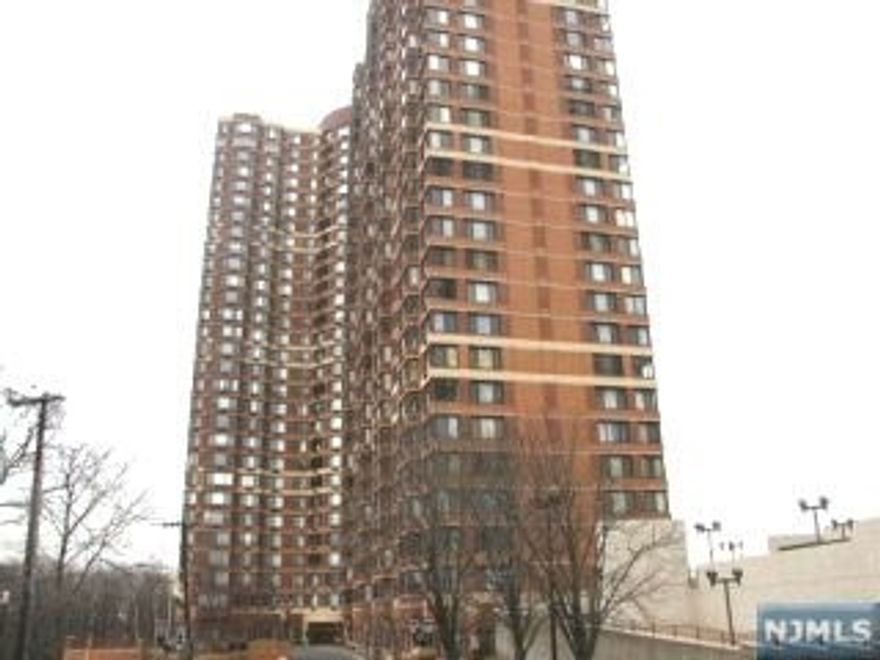 Rent this luxurious high rise condominium with amazing NYC and Hudson River views. Renovated hardwood floors, open kitchen and 1 1/2 bath. Indoor parking space included. Gym, library, children's playroom, and outdoor patio and pool make this a great opportunity to live in Fort Lee. This building offers full service concierge and security.