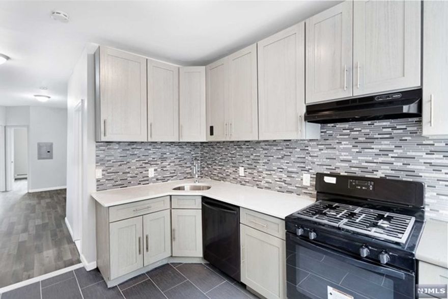 Location! 3-bedroom 1-bath apartment for rent conveniently located within minutes to The Hudson Light Rail. Located on 2nd floor of commercial mixed-used. Completely renovated apartment offers a spacious kitchen featuring stainless steel appliances, tasteful cabinetry, & granite countertops. High ceilings. Freshly painted, new windows. Baseboard heating & window AC. NYC transportation at door. Near Shopping, variety of restaurants, & schools. Tenant pays for all utilities with the exception of cold water & sewer. Due at signing of the lease: 1st month rent, 1.5 month security, and 1 month broker's fee PAID BY TENANT) One cat can be considered on a case by case.