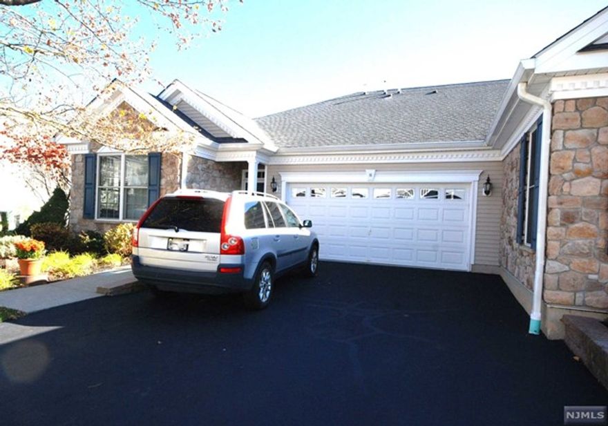 Highly desired, 8-year young, one-level RIESLING Villa in this premier gated community! An end unit with plenty of windows, tray & coffered ceilings and the upgrades you desire. A bright and sunny gourmet kitchen with light cream cabinetry and all the bells & whistles. The primary bedroom suite is generous in size with two walk-in closets and a luxurious bathroom. Features include custom window treatments, wood trim accents, two-car garage w/storage & balcony off kitchen with views of the scenic grounds. Resort style living with a 25,000 sq. ft. clubhouse w/indoor/outdoor pool, tennis, pickleball, putting green, fitness center, card rooms/Mahjong, clubs, activities and so much more. Bordering the town of Montclair with terrific restaurants, theaters, shops & boutiques. A delightful lifestyle is here to enjoy!