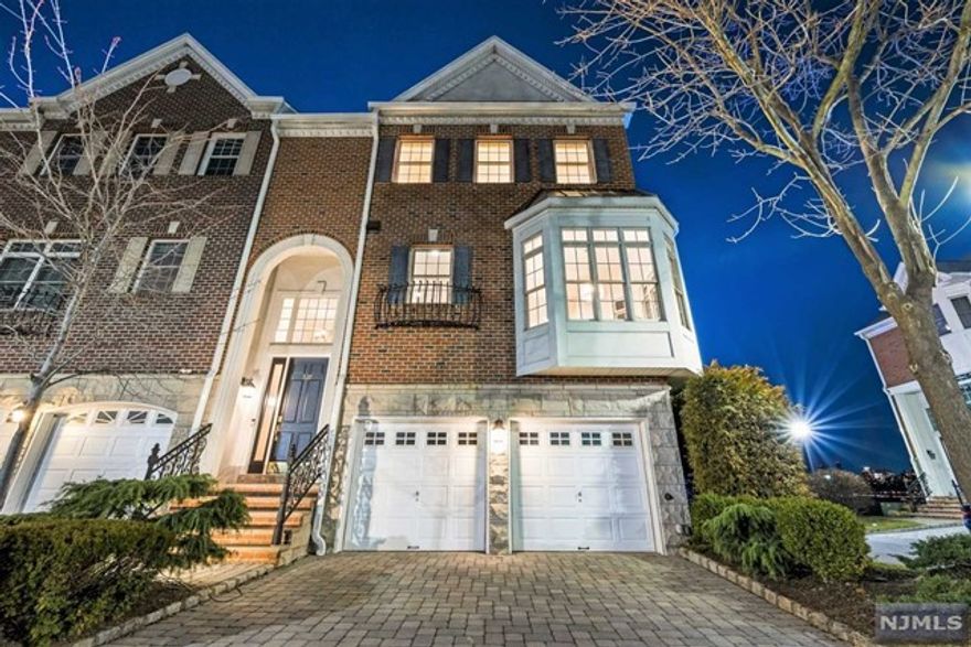 520 Harbor Place is the corner Townhouse in a beautiful riverfront community just across from midtown Manhattan. At 4,000 sq. ft. this rarely available 'mega townhouse' facing south and west has been extensively upgraded, is 4 levels w/elevator, 4 bedrooms, 4.5 bathrooms, & has 4-car parking! Lofty 10"ft high ceilings and giant windows allow endless natural light during the day, and city light views at night. It has an open floor plan and wraparound decks on every level = ideal for entertaining. Main Level features a gourmet French kitchen with center isl. and sunny breakfast room. Lower level has big family room w/private backyard where you can see the tide roll in, with direct access to 2-mile boardwalk along Hudson River. Master Suite is enormous with wraparound balcony, "his and her" walk-in closets w/custom shelving, and spa-like master bath. The home's located by he community's private pool and playground, and has free door-to-door shuttle, to Port Imperial ferry.