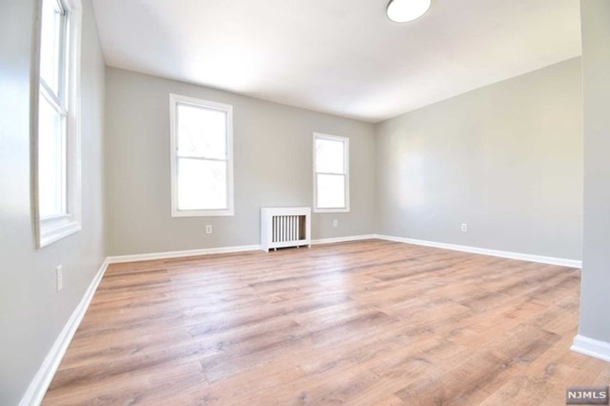 Landlord covers broker fee! Welcome to your newly renovated oasis in the heart of Jersey City! This stunning 2-bedroom apartment with a den offers contemporary living at its finest. Step inside to discover a space that has been completely revitalized, boasting brand new flooring throughout that exudes modern elegance. The kitchen features sleek stainless steel appliances that perfectly complement the chic aesthetic. Both bedrooms are generously proportioned and offer ample closet space. The den adds versatility to the space, offering endless possibilities as a home office, guest room, or cozy reading nook. Conveniently located just minutes away from the NJCY Journal Square Path, commuting is a breeze, allowing you to effortlessly explore all that Jersey City has to offer. With its prime location and luxurious finishes, this apartment is the epitome of urban living. This is a 13 month lease!