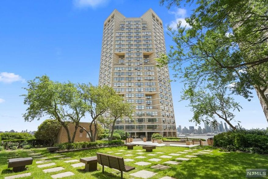 This 36th-floor apartment in the Galaxy Towers complex offers gorgeous sunset views of the New York skyline and features 2 spacious bedrooms, a renovated kitchen and bathrooms, hardwood floors throughout. NO POP CORN CEILINGS. Laundry room located in same floor. HOA includes: Electric, Heat, A/C, Water and Gas. Building has five star amenities which include but are not limited to: concierge services, spa , playroom, indoor and outdoor pool, tennis courts, health club and on-site shops -all without having to step outside! With 24-hour buses available to 42nd Street (5 miles away) and River Road Ferry Terminal, commuting couldn't be easier. The city is rich in attractions, including restaurants and shopping, waterfront entertainment and much more. Not included, cable and parking ($125 per car) Galaxy Towers welcomes pets.