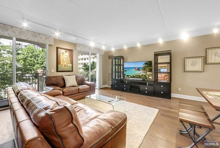 Newly renovated, in mint condition, spacious and bright 1 Bedroom and 1 1/2 Baths apartment in Admiral's Walk condominium, known for its amazing amenities and outdoor living. The apartment features oversized living and dining room, floor to ceiling windows, hardwood floors throughout, master bedroom with master bathroom, eat-in windowed kitchen, well designed track lighting system, large and private terrace and abundance of closets and storage space. The building is located near great transportation to NYC by ferry or bus, shopping and many great restaurants.