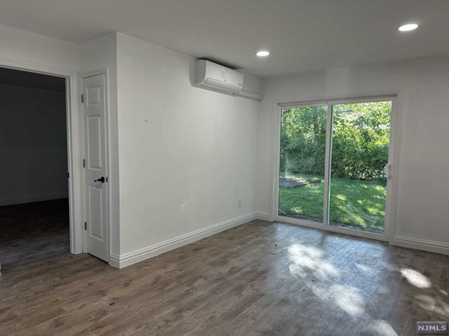 Totally renovated side by side 1 bedroom unit with a huge bonus room. Each room has brand new air conditioner/ heating units and LED lights. Brand new kitchen with dishwasher. Washer and dryer in unit. This unit equipped with brand new modern convenience. Living room has SGD to backyard. Ample parking spaces. A minute walk to NYC Bus(Rockland Coach #20). Close to school, park, and shopping. Tenant pays first month rent, 1.5 month for security deposit, and 1 month for broker fee upon signing the lease.