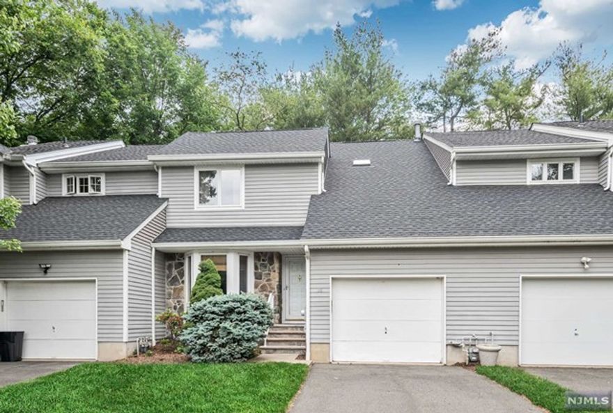 Welcome To This Meticulously Maintained Townhouse In A Quiet Neighborhood At The End Of The Cu-De-Sac. As You Enter, The Foyer Leads You To A Bright & Sunny Kitchen, W/Cozy Eating Area, Pantry Closet & Newer SS Appliances. The Cathedral Ceiling In The DR Creates An Open & Airy Atmosphere Flowing Into The Spacious LR. You'll Find A Wood-Burning Fireplace & Access To The Deck. The Second Level Offers An Oversized Suite W/Walk-In Closet & FBTH Featuring A Soaking Tub & Shower. The Second Bedroom Is Equally Spacious, W/Its Own FBTH. Convenience Is Key W/Second-Floor Lndry. Highlights Include First Fl HBTH, HW Floors, An Abundance Of Windows, Plenty Of Storage & One-Car Garage. Location Is Everything.. Top-Rated Schools, Minutes To Major Highways, Restaurants, Shopping, NJ Transit Bus & Train Center, Wayne Township Library, Golf Courses, Trader Joe's, & Whole Foods, You'll Have Everything You Need Right At Your Fingertips.