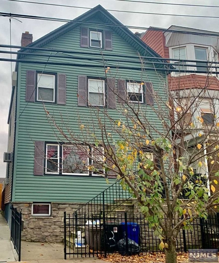 Recently renovated 1-family house with 4 good-sized bedrooms & 2 baths. Maximum occupancy 6 people. Eat-in kitchen with SS appliances, white shaker cabinets, quartz countertops, herringbone tile backsplash & porcelain plank flooring. Hardwood floors in living & bedrooms. 1st-floor bath features an oversized shower. Spacious fenced-in yard and patio. Tenant is responsible for yard maintenance, snow removal & all utilities including water & sewer. Refrigerator, dishwasher, washer & dryer included. No smoking inside the house. Attic excluded. Designated area in basement for storage & laundry. Street parking only. 1 small fully-trained dog or cat under 15 pounds is allowed. Bus 40 a block away to Harrison Path station. One-month broker's fee to be split between Landlord and Tenant. Each pays $1300. Application, tenant background check, good credit, and proof of income required. Photos taken a couple years ago. Furniture left inside the house can stay. Minimum lease term 14 months.