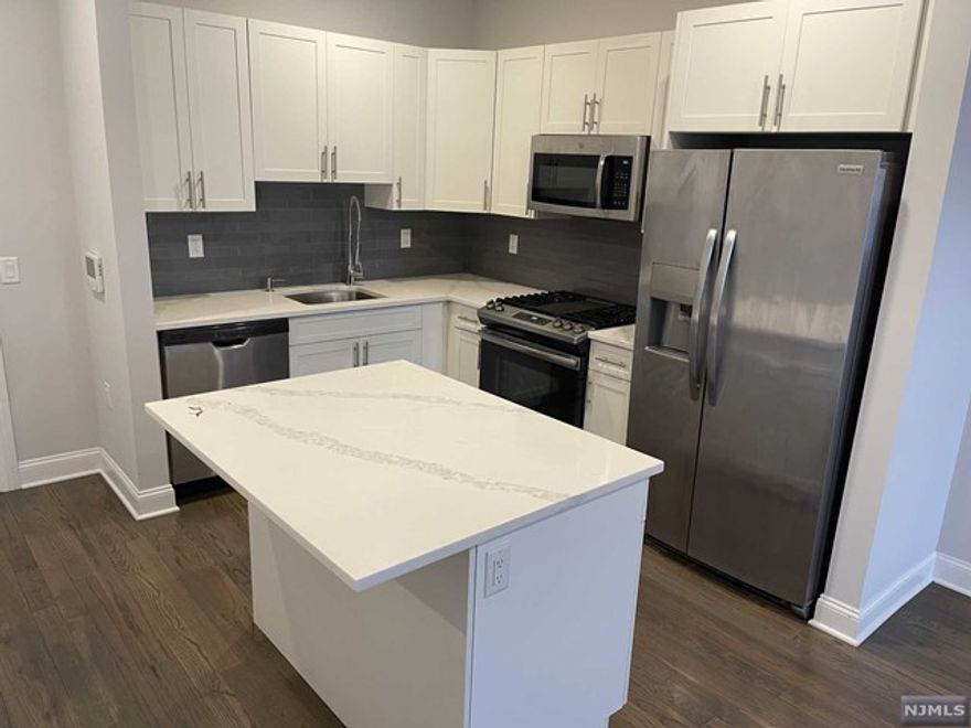 One parking spot included in rent! 40 Park features modern units with spacious floor plans & high end finishes. Some highlights include: beautiful modern kitchens with stainless steel GE appliances, full kitchen island, wood floors, large washer and dryer in each unit, master baths with large walk-in showers and many units with views of the creek, tennis courts and high school fields! One outdoor parking spot included in the rent. Blocks away from the train for an easy access to New York. 15-20 lb pet limit (pet fee applies). Within blocks to all Park Ridge has to offer including brand new stores and restaurants. Tenant pays for utilities. Less than 5 minutes from the brand new Shoppes at Dipiero Farms - featuring Wegmans, Chipotle, Starbucks and much more. Available immediately! Non-refundable $250 move-in fee due at lease signing.