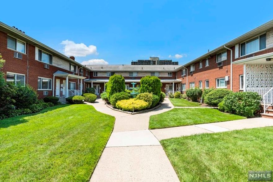 The most spacious of all the units within this complex. Solid hardwood floors throughout, full of bright and natural light, plenty of storage space, including a walk-in closet, a private balcony and spacious common area. Just blocks away from a premier grocery store, post office, Nyc bus stop, restaurants, shops, and public school number 4 - all within the cozy, secure, and friendly Fountain View Gardens located in the heart of Fort Lee. Very low HOA - $317/month, Parking options $35/month car space, $70/month garage.