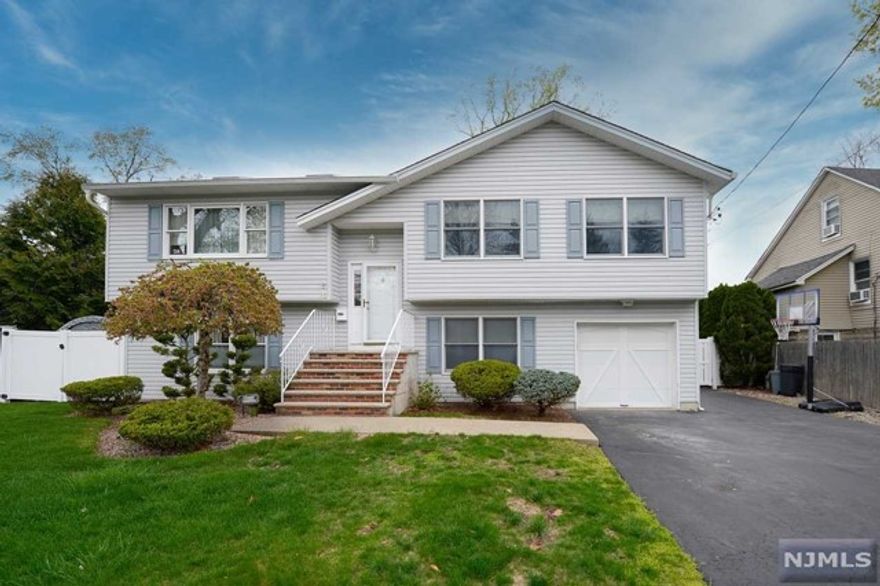 Great rental in Westwood! Private entry way to one floor living with gleaming hardwood floors and modern kitchen and bath. Three bedrooms! Use of yard! Storage! Two parking spots! Very short walk to downtown Westwood, park and NYC bus!