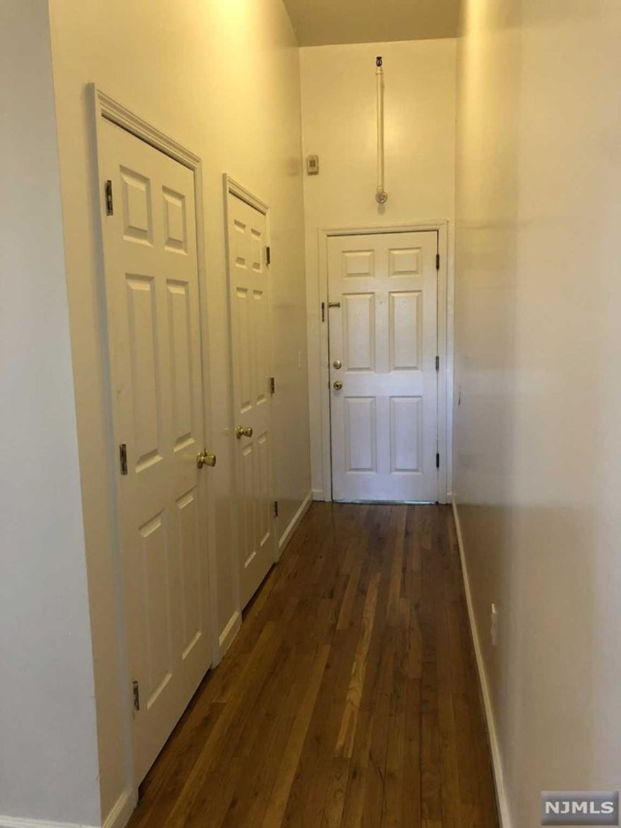 Extremely spacious and bright one of a kind 3rd floor unit! This apartment is on the top floor of the building so there is no one above you. All rooms are large and have very high ceilings to make the apartment feel even larger! This apartment is located in the center of town within walking distance to all major bus stops. The town also has its own train station and downtown area filled with restaurants and places to shop There are 2 bedrooms, an eat-in-kitchen (refrigerator included), large living room, clean white bathroom, entry hallway and lots of closet space. Heat and hot water are included, laundry in the basement along with storage. No pets. *Pictures from unit 17 (directly next to this one).*