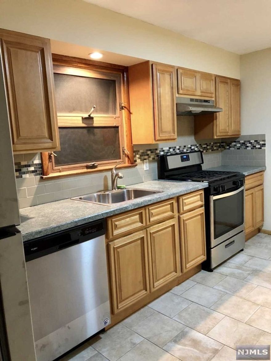 Great Location! 2 Bedroom Apartment with hardwood floors throughout, newer kitchen Stainless steel appliances, washer and dryer in basement, spacious closets in both bedrooms and LED lighting with dimmers throughout the whole apartment. Is conveniently located in a quiet one way street. Few blocks to Harrison Path Station, minutes to Newark Train Station, less than an hour drive to Newark Airport. Landlord pays half of Brokers fee.