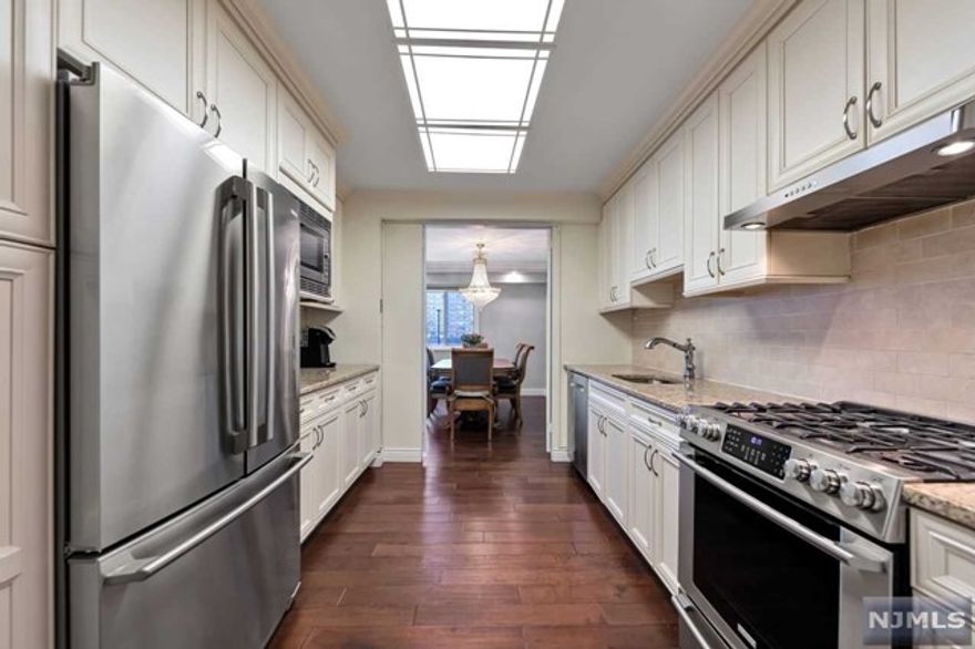 EXQUISITELY RENOVATED & SPACIOUS (APPROX. 1730 SF) 3 BDR/2 BTH APT. IN PET FRIENDLY CO-OP BLDG STRATEGICALLY LOCATED FOR EASY COMMUTE TO NYC. THIS TOP TO BOTTOM RENOVATION IN 2016 OFFERS STUNNING KITCHEN W/WOOD CABINETS, GRANITE COUNTERS, S/S APPLIANCES, GORGEOUS TILED BATHS, HARDWOOD FLOORS, CARPETS IN BDRS, CROWN/BASE MOLDING, DOUBLE PANE WINDOWS, LOTS OF CLOSETS,GLASS ENCL.BALCONY. ONE DOG <25 LBS OK. MAINTENANCE OF $2011.09 INCL. ALL TAXES, UTILITIES, AMENITIES SUCH AS: 24 HR DOORMAN, HEATED SALT WATER POOL & HOT TUB; 1/2 BASKETBALL CT; PLAYGROUND AND TO BE BUILT GYM & BUS. CTR/COMM. RM. CABLE IS $71 P/M. PARKING $55-$65 P/M. CLOSE TO SHOPPING, ALL HIGHWAYS, LOADS OF PARKS & GREEN SPACES/HIKING/BIKING TRAILS. LOCATION IS BEST OF ALL WORLDS: CONVENIENCE OF URBAN LIVING WITH PEACE OF SUBURBIA. QUALIFICATION TO PURCHASE ARE: MIN 20% DOWN, 4X INCOME TO HOUSING EXPENSE+1X OTHER DEBT. CASH BUYER WITH NO ADD'L DEBT NEEDS $102K AGI