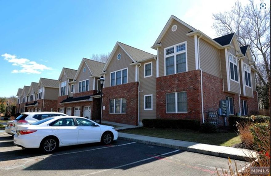 LUXURY TOWNHOUSE IN DESIRABLE TENAFLY SCHOOL AREA. SUNNY 2 BR, 2 BATH WITH MASTER BATH, 2ND FLOOR, SOUTHERN EXPOSURE. LIVING ROOM WITH FIREPLACE. HIGH CEILING MASTER BEDROOM SUITE AND NICE SECOND BEDROOM WITH FULL BATH. GRANITE KITCHENS AND BATHS, GAS FIREPLACE, CROWN MOLDING AND WOODWORK, WHIRLPOOL TUB, STAINLESS STEEL APPLIANCES, SECURITY SYSTEM. GREAT LOCATION! WALK TO BLUE RIBBON SCHOOLS, CLOSE TO TOWN, SCHOOL, WORSHIP, SHOPPING AND NYC EXPRESS BUS.