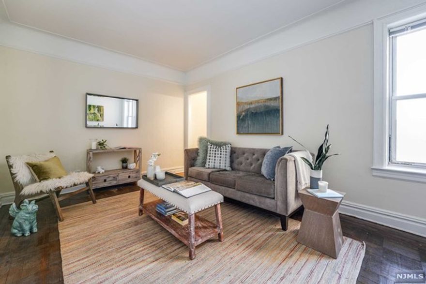 Welcome to The Ariston, a distinguished pre-war, elevator building located on one of the most desirable streets in Jersey City Heights. This 1 bed, 1 bath, second floor unit offers hardwood floors throughout, a freshly updated kitchen including brand new appliances and a gracious flow into the expansive living space. The updated bathroom sits right off the generously sized bedroom, with plenty of room for your furniture. The entirety of the apartment is filled with great natural lighting, offering an inviting feeling. Sitting just a few minutes from great restaurants and Pershing Field Park, all while being conveniently located with easy access to NYC, Hoboken, And Downtown JC.