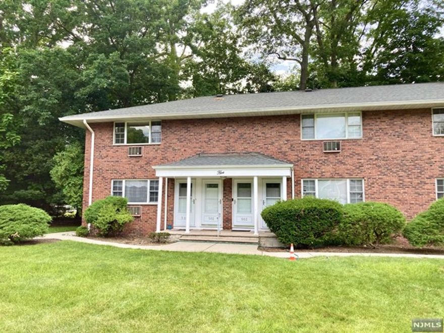 Lovely 2nd floor apartment with newer Kitchen & Bathroom! Interior just painted, with gleaming hardwood floors in the Living Room, Dining area & Bedroom, 70% of which has to be covered with area rugs. Living Room with built-in wall AC, Kitchen with newer Cabinets, Refrigerator, Stove/Microwave, granite Counter Top & Sink. Newer Tiled Bathroom with window, apt to be painted & professionally cleaned prior to possession. One assigned parking space, guest & street parking. Rent includes: heat, hot & cold water, cooking gas, landscaping, snow removal & parking lot maintenance. Coin operated Laundry facilities & a small storage area in rear basement. No pets. This is a none smoking unit! Tenant application, credit check required. Also needed: one year's lease, one month security & a one time non refundable fee of $600 for repainting, refurbishing & cleaning. Quiet location yet conveniently located to town, for restaurants & shopping, NYC bus & train transportation.