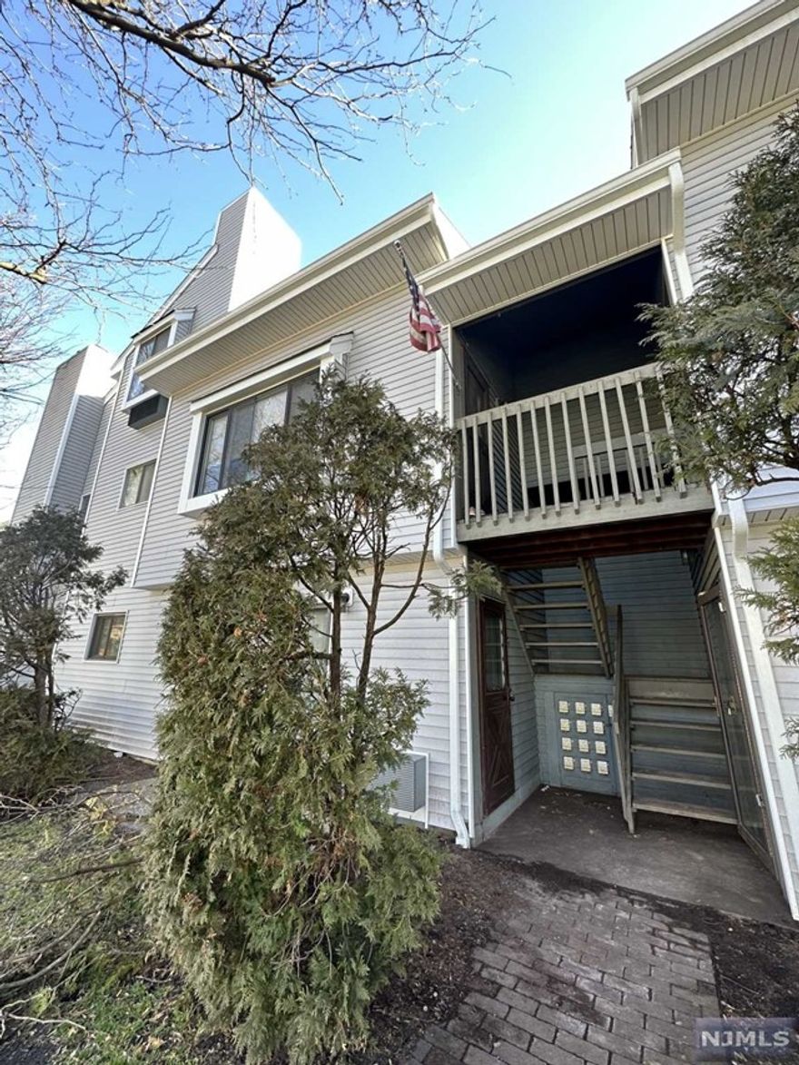 Two story unit first floor living room with fireplace, dining area, pantry, coat closet, loft area on second floor, Laundry, 2 full bathrooms, suite with walk in closet, and bathroom, one garage parking, and out space.