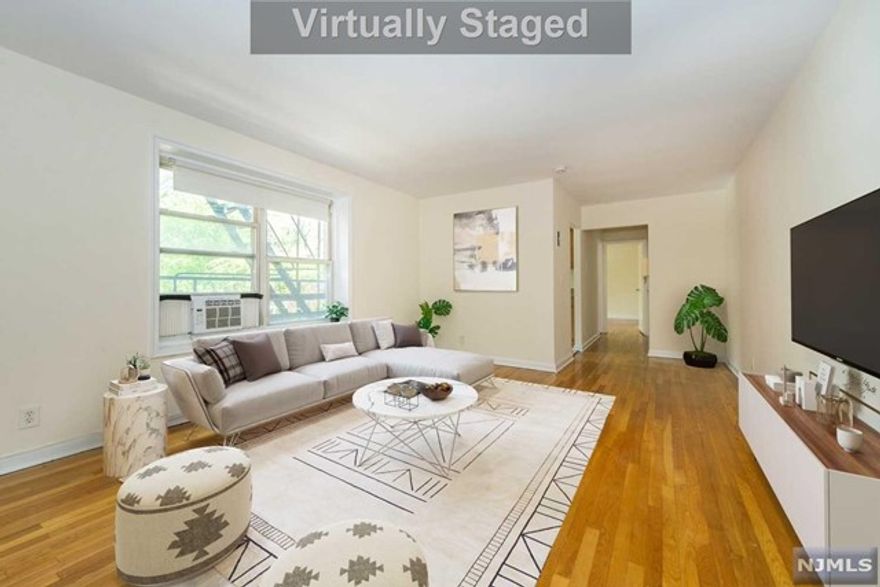 Sunny, freshly painted and spacious 1 Br, 1 Ba condo in a well maintained elevator serviced building. Situated in park like setting and yet conveniently located across from NYC bus stop with short commute to NYC and walking distance to shops, restaurants and major highways. HOA fee includes heat, water and parking in 1 car garage. Worry free living with maintenance on site is a great option for a first home, downsizing or an investment property.