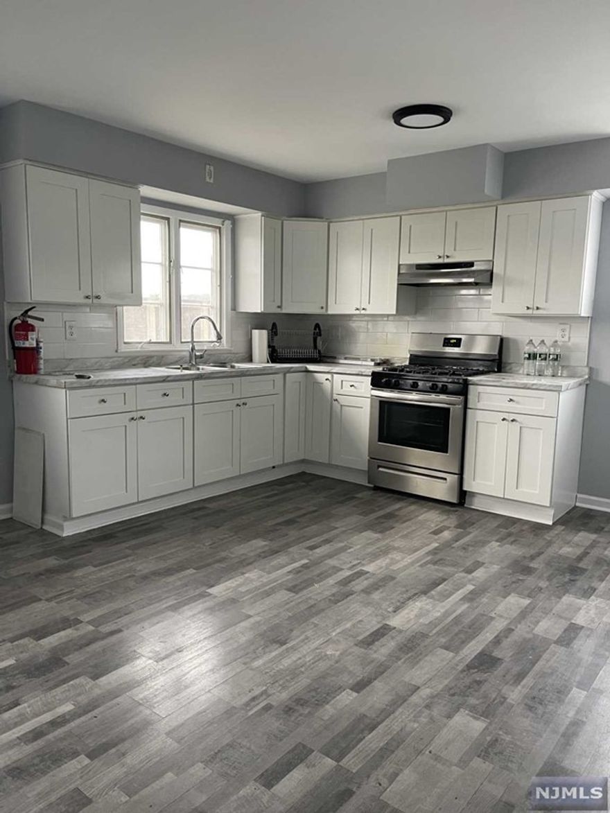 Welcome to this beautiful renovated second floor unit which offers 3 beds, one bath, large Living Room, Dining Area Kitchen w/lots of gorgeous cabinet + counter space. Some of the updates include new floors, fresh paint, led recessed lights, new kitchen and many more to list!Unit also includes off street parking and close proximity to schools and parks, close to shopping, Montclair Univ and all major highways I-80, Rt 3, 46, 23 and GSP. No Pets.