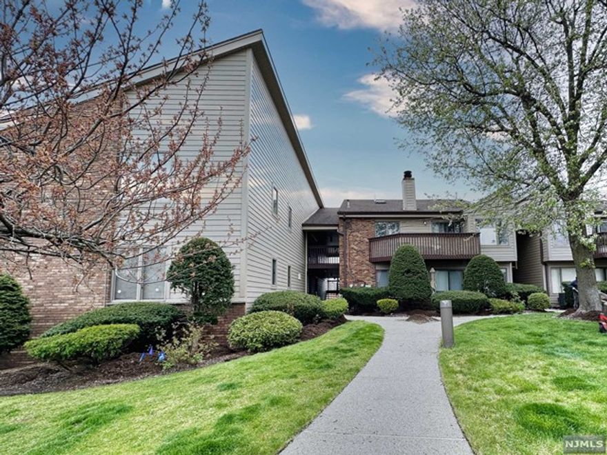 Welcome home to this beautifully updated, spacious and bright 2bed 2.5 bath unit at the Evergreen Condo. Unit offers high quality wood floors throughout, a cozy fireplace , recessed lights, updated open kitchen, sliding glass door to balcony off the dining area, a spacious finished lower level for a recreation room/office with .5 bath, 1 indoor garage with additional designated parking space outside . Building has recently been updated with new siding and new roof. Complex is conveniently located close to major highways and NYC transportation in walking distance. Come see and make this your new home!!!