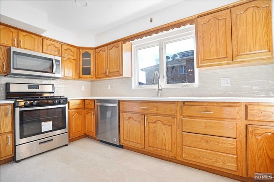 HUGE 3 bedroom, 1 bathroom rental in the heart of Fairview! Completely renovated, with TWO PARKING SPACES INCLUDED! (one garage space and one driveway space) Steps from transportation into NYC. So many restaurants and shops within walking distance. Ideal location! Very large layout... rooms are all generously sized. Kitchen Features Quartz Countertops and Stainless Steel DW, Micro, and Oven. Laundry is available for your convenience in the basement. Tenant is responsible for Gas, Electric, Hot Water, and Snow Removal. Credit check & Interview required. Small Pet MAY BE CONSIDERED. One month Broker Fee applies.