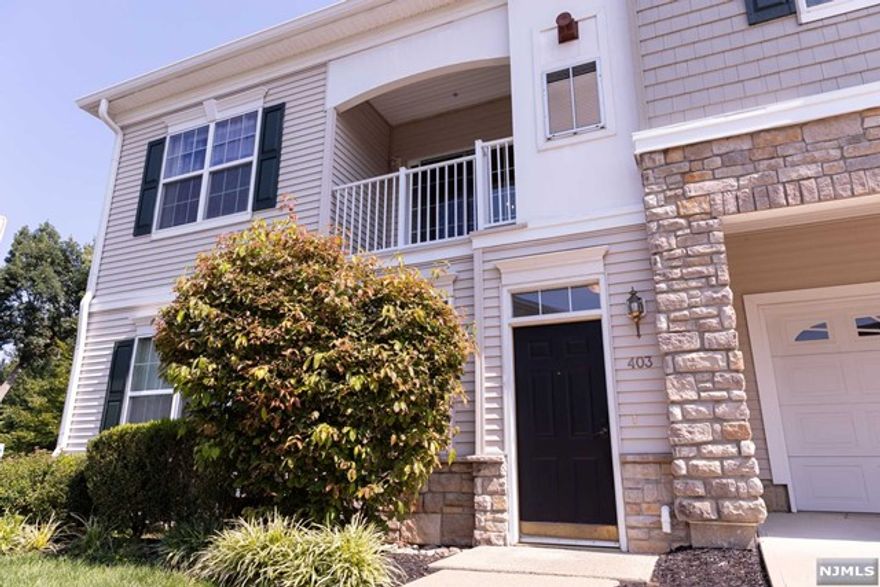 LOCATION, LOCATION!! AMAZING END UNIT! Very short distance to Clubhouse, Pool, etc. -plus a very scenic view from Primary suite... This home has it all! Front door entry into house (No hallway), garage attached..ready to move right in! Ground Level-one car garage, First floor features include beautiful gourmet style kitchen with breakfast bar,42 inch cabinets, granite countertop, stainless appliances, entertain/relax in the sumptuous living room with soaring ceiling overlooking dining area, ( lovely balcony situated off dining room), bedroom, full bathroom, laundry room complete this level. Second floor -spacious hallway leading to Primary suite/walk-in closet, full bathroom/double sinks. Enjoy the amenities which include pool, gym, billiards, party room, clubhouse. Conveniently located near shopping, restaurants , NYC trans. Just unpack -move right in and enjoy easy living at The Grande!