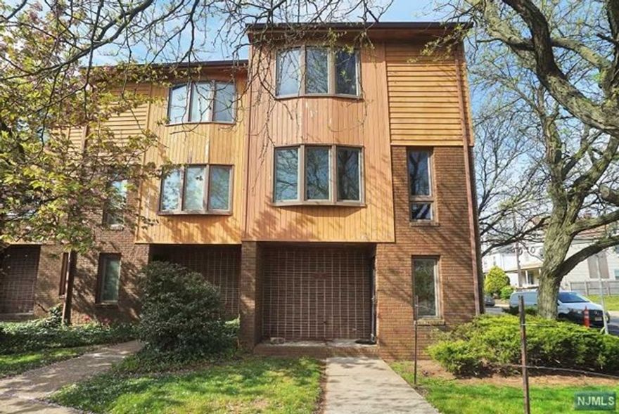 Location, Location, Location! Won't Last Long! Gorgeous Updated 3 Level End Unit Townhouse offering 1600+ Square Feet. Large Living Room, Dining Room, 2bdrm, 1.5 Baths, with incredible Day Light. Hardwood Floors, 2 Decks and 1 Car Attached Garage. Kitchen W/ Granite Counter Tops, Stainless Steel Appliances with Window and Balcony. Includes laundry room with top of the line washing machine & dryer. Also set up with central air conditioning and heat. Close to Train Station, Major Highways, NYC Bus, Rutgers University, Conference Center, Downtown Area W/ Shopping, Restaurants & Entertainment.