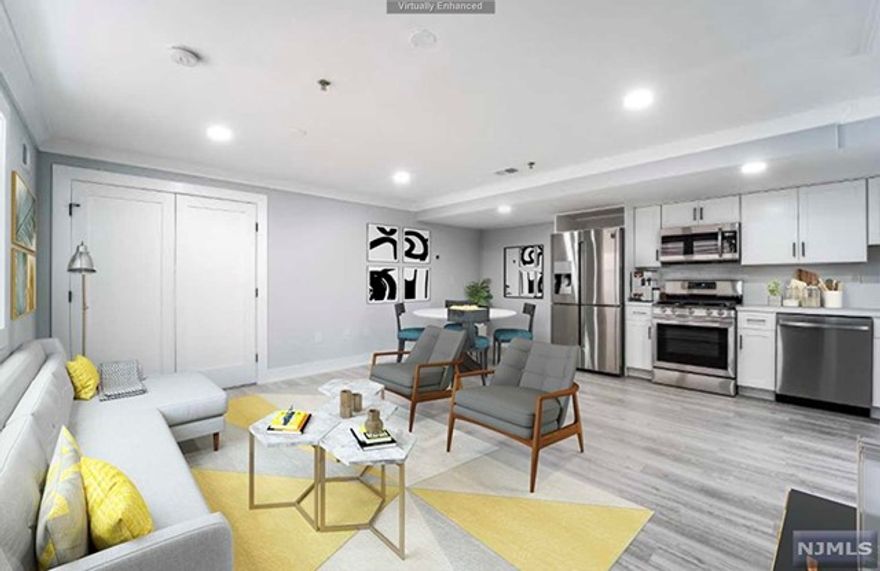 Welcome to Union City! Envision yourself in your new stunning, completely renovated, extra-large, 2bdrm 1bath 856 sf condominium completely upgraded to make life easy. Walk into your bright and open living/dining room featuring recessed lighting. Brand new kitchen boasts shaker style white cabs with tons of storage, calacatta quartz countertops and stainless steel appliances including, 4 door fridge, microwave and gas range. LVT flooring throughout. EEnjoy outdoor space in your quiet, shared yard with tons of potential (yard photos are virtually hstaged). The best part is your own deeded driveway parking spot! Very accessible location, close to shopping, dining, schools, houses of worship and easy access into NY Port Authority, Lincoln Tunnel, all major highways. Seller pays 1st yr of taxes. VIRTUAL TOUR: https://my.matterport.com/show/?m=QEtRxCGxphF