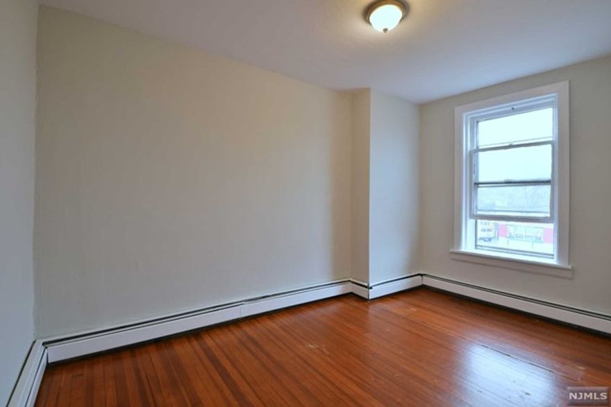 Beautiful & spacious one bedroom apartment on second floor. Freshly painted and hardwood floor throughout. Huge walking in closet. Conveniently located on main street in Clifton. Walking distance from public transportation, park, shopping center and minutes from major highway. Credit check and employment verification a must.