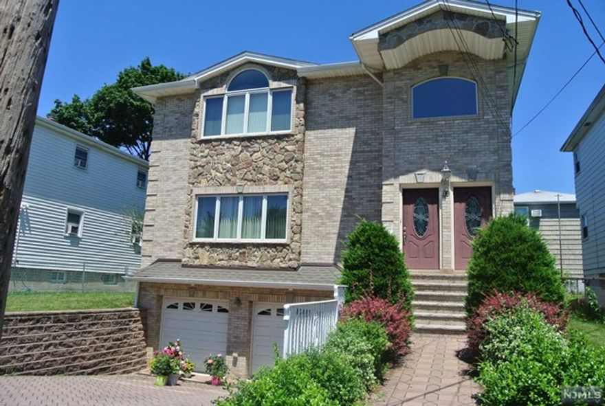 Spacious 2nd floor unit with 6 rooms, 3 bedrooms, 2 full bathrooms, hardwood floor throughout, new kitchen SS appliances, master bedroom with master bath, washer/dryer in unit central air. Conveniently located close to super markets, public transportation, parks and schools. unit is freshly painted and ready to move in.