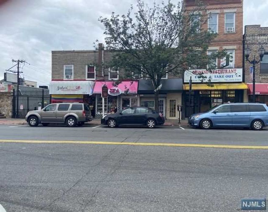 Investors opportunity to own a mix use property. Location! Location! Close to Shopping, Bus, Park & School. 3 retail stores & 2- 1 Bedrooms, 4-2 bedrooms, RARE driveway for 2 cars. Property runs from 7014 THUR 7018 Bergenline ave
