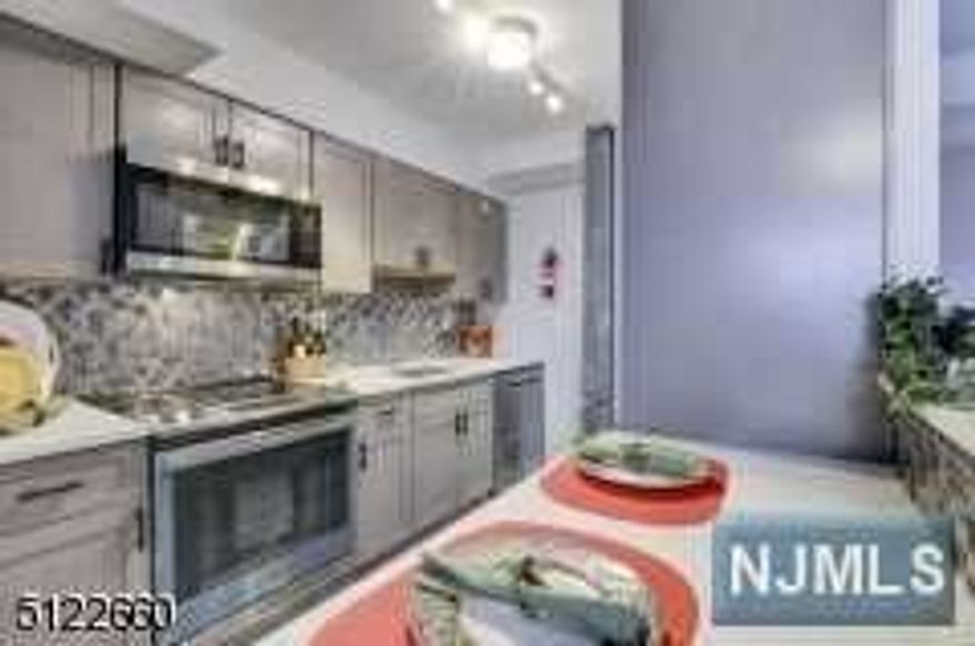 Come Home to this beautiful fully renovated 10th floor 2 bedroom, 1 bath CO-OP. This East facing, this newly done unit in a luxury high rise has a new galley kitchen with a backsplash you will adore, upgraded stainless steel appliances, new baths, and generous sized bedrooms, each with double closets. Add to that sleek dark wood natural floors. This popular Coop features a 24 concierge, included utilities (electric, heat, hot water), underground parking ($60/mo), comp jitney to the NYC train, a backyard gorgeous "secret garden", first floor gym and bright, clean basement laundry. Just blocks from access to GSP and Route 280, this is one of the best NYC views in Essex County! Coop approval required and 20% down payment needed. Ownership shares - 345 . HOA monthly fee includes all taxes, maintenance and all utilities (heat, hot water and lights). See details on entrance requirements and move-in fees (low closing costs).