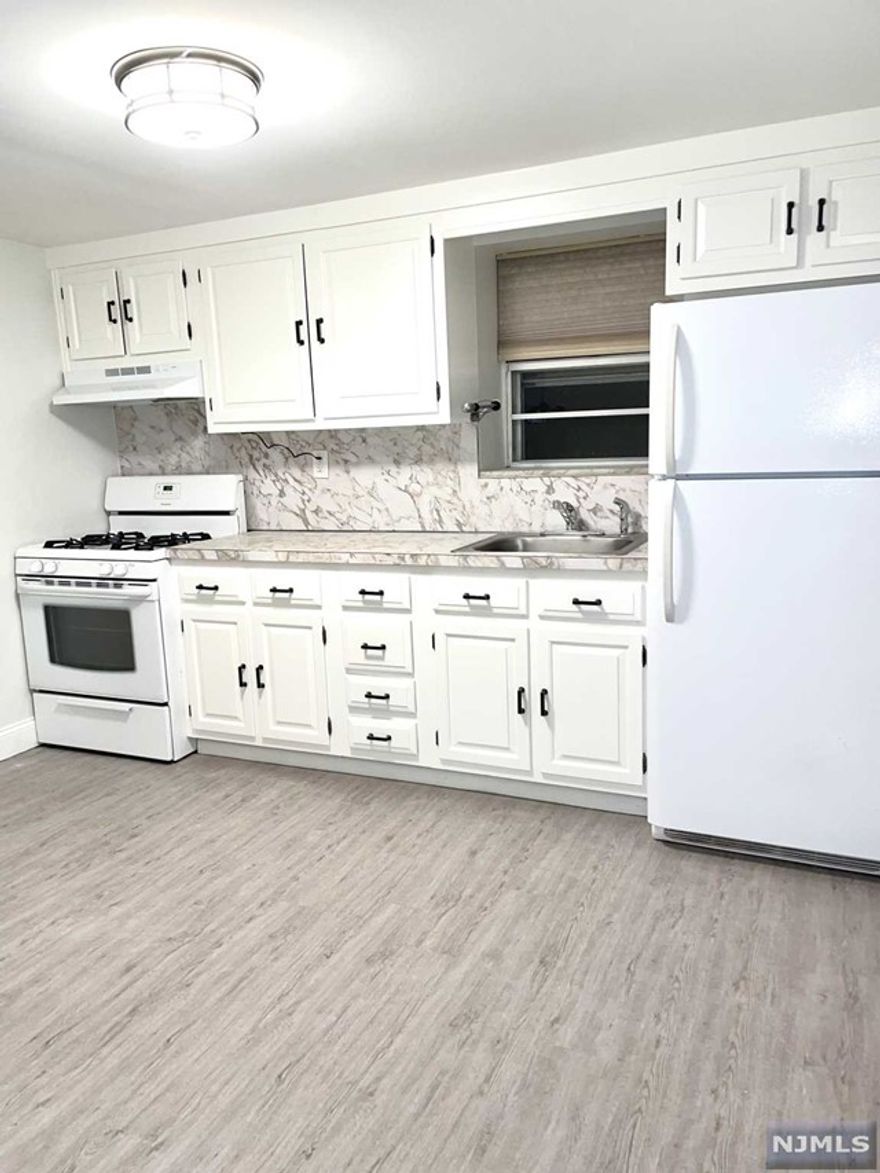 NEWLY RENOVATED APARTMENT WITH LARGE SUN FILLED LIVING ROOM, DINING AREA, LARGE BEDROOM, NEW FULL BATH AND LARGE EAT IN KITCHEN. ALL UTILITIES PAID BY LANDLORD, WASHER/DRYER SHARED, CENTRAL AIR AND SO MUCH MORE! CLOSE TO GWB,SHOPS,RESTAURANTS AND ALL MAJOR HIGHWAYS. A MUST SEE!