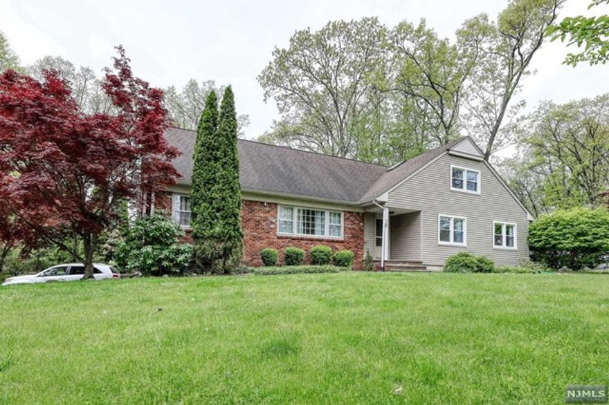 Gorgeous raised ranch in wonderful neighborhood of the most desired Sicomac section. First floor features a large living room, dining room, modern eat in kitchen with fireplace, large family room with vaulted ceiling and skylight and access to the deck and backyard, master bedroom with bath, plus 2 bedrooms and full bath. Second floor features 3 additional bedrooms one bath and huge attic space for storage. Great views to private rear yard. Full unfinished basement, with door to garage. Hardwood throughout. Tenant credit check required. Central A/C, 2 car attached garage. Small pets may be considered. PSE&G worry free service contract required paid by Tenant.