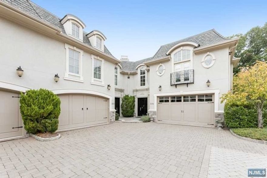 GORGEOUS 6,000 SF TOWNHOUSE LOCATED IN BELLAIRE, THE MOST DESIRABLE TOWNHOME COMMUNITY IN NORTHERN NEW JERSEY. THE STUNNING INTERIOR INCLUDES 3 BEDROOMS, 4 FULL & 2 HALF BATHS, AMAZING MOLDINGS & TRIM WORK THROUGHOUT, HIGH CEILINGS, ELEVATOR TO ALL LEVELS, DREAM GOURMET EAT-IN KITCHEN,3 FIREPLACES, HIGHEST QUALITY WOOD FLOORING, DESIGNER HOME, THEATRE. THIS EXCEPTIONAL TOWNHOME OFFERS LUXURY LIVING AT ITS VERY BEST!