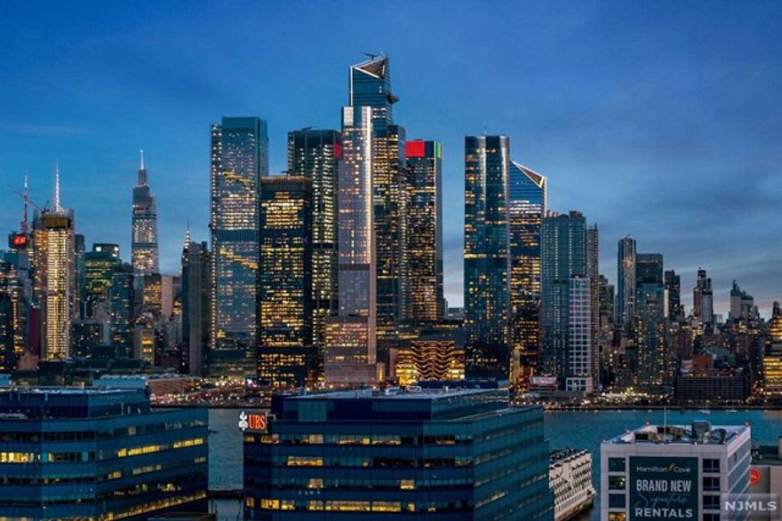 Welcome home! This luxury high rise along the cliffs of Union City at Troy Towers is a must see! Enjoy the direct 180* panoramic views of NYC, Hudson River and downtown JC. This 1 bed 1 bath unit is sure to please. The open layout kitchen has SS appliances, quartz counters, breakfast bar to the living room makes it perfect for entertaining. Enjoy the large terrace with floor to ceiling windows to take in the spectacular views. To complete the unit there is a generous size bedroom with spacious closets and an updated full bathroom. Maint. includes all utilities, taxes, basic cable TV and pool. Garage parking available for $150/mo. Pet-friendly coop with gym $240/year, Amazon hub, bike storage and laundry on every floor. Enjoy easy commute withe free weekday shuttles to Ferry & Light Rail, morning shuttle to PATH and NJ Transit bus to NYC at the front door!