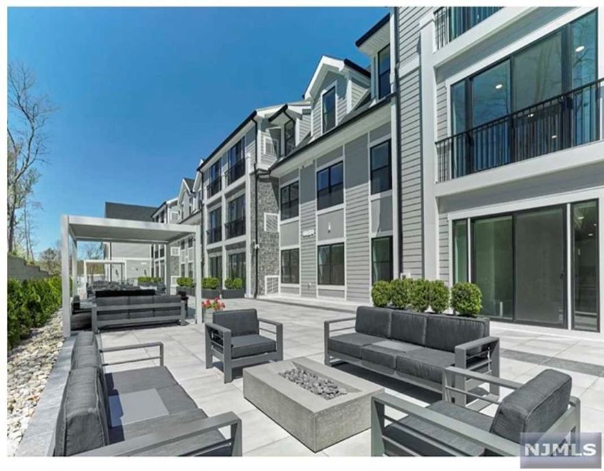 Newly constructed boutique luxury living at its finest located in the heart of prestigious Franklin Lakes. Customized to provide flexible live and work options while never compromising on style, this light and bright unit features 9 ft. ceilings, some with Juliet Balcony, modern eat-in kitchens with Quartz countertops & Stainless steel appliances, living room/dining area, two bedrooms including large primary bedroom suite with spa-like bathroom and walk-in closet, stylish hall bathroom and laundry. The building is loaded with amenities including fitness center, golf/sport simulator, playroom, movie/media room, community lounge with pool table, workstations, expansive outdoor patio with grilling stations, fire pits, dog run and dog bath. Each unit comes with one underground parking space equipped with EV charger hookup. Additional parking and storage available. No broker fee!