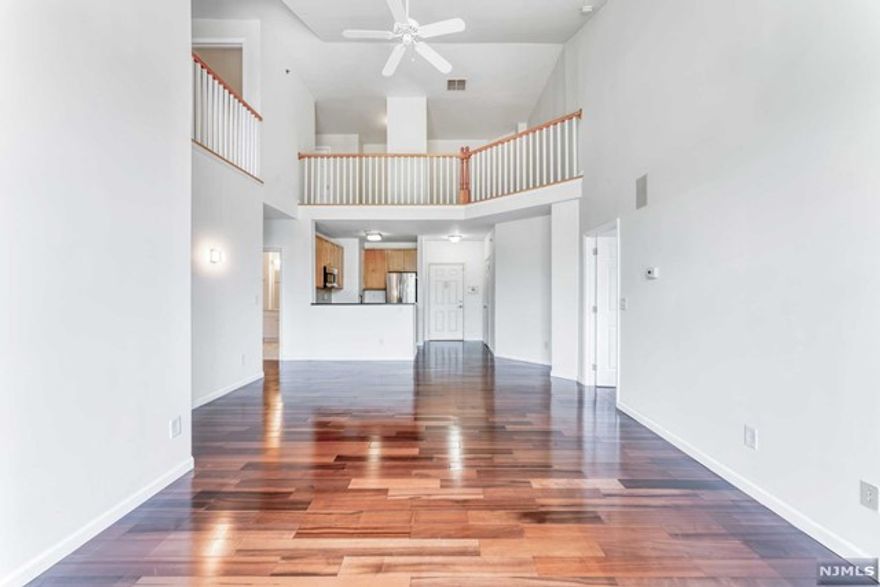 Amazing opportunity to own a two story, top floor, 3 bedroom unit at the Hudson Club. This unit boasts super large windows in the living room, with vaulted ceilings. Loft second floor overlooks first and gets to enjoy the sunlight and views out the large living room windows. Renovated bathrooms, new hardwood floors, and new appliances to make this absolutely move in ready! Hudson Club boasts incredible amenities such as indoor basketball court, tennis courts, a resort-like pool, and much more. Building 24 receives packages so your Amazon deliveries are just an elevator ride away and not a walk across a parking lot! This is easy waterfront living, come take a look today!