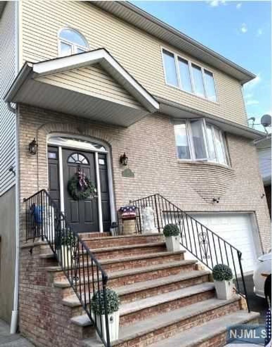 Beautiful and bright, large open floor plan boasts 3 bedrooms, 2 bathrooms with gleaming hardwood floors, large eat in kitchen, living room and dining room. Master bedroom has a master bath. Washer and dryer in unit, central air and heat. Refrigerator included. Bedrooms are carpeted. Close to shopping and NYC bus. No pets. Street parking only. Good credit, income and interview required. 24 hour notice required, tenant occupied.